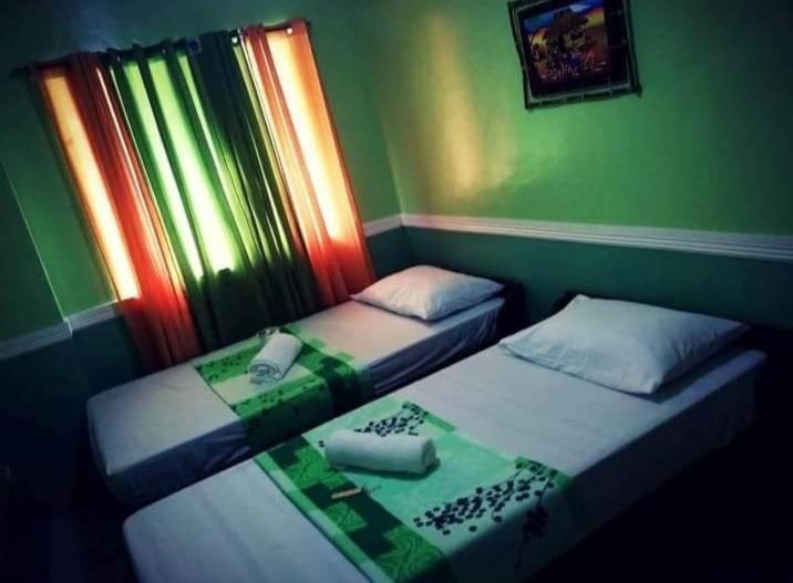 Santimart Backpackers Coron Hotel Buitenkant foto